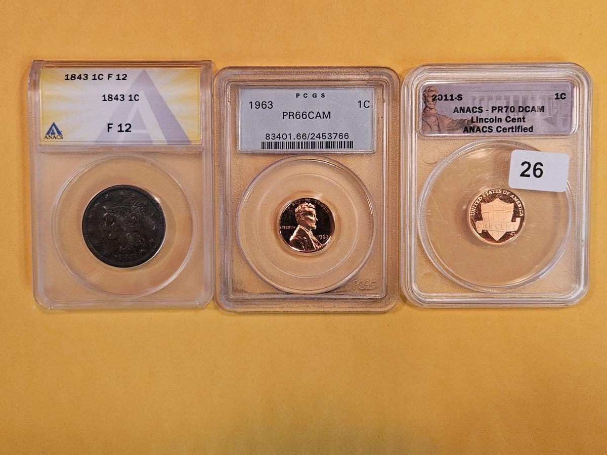 Three graded, mixed Cents