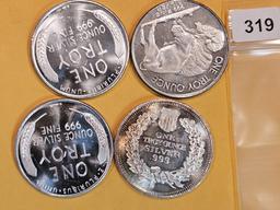 Four 1 Troy ounce .999 fine silver art rounds