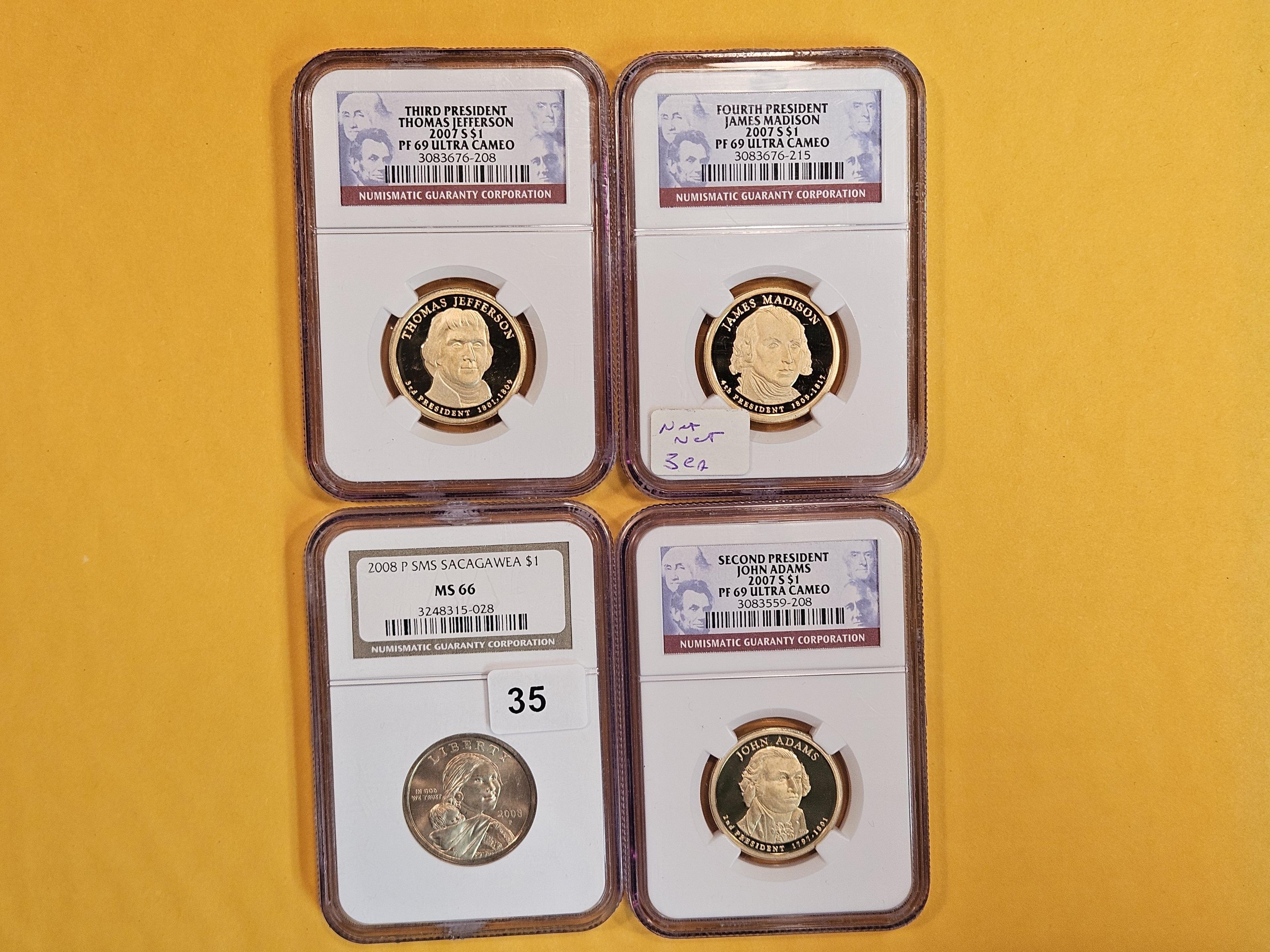 Four NGC-graded proof and GEM modern Dollars