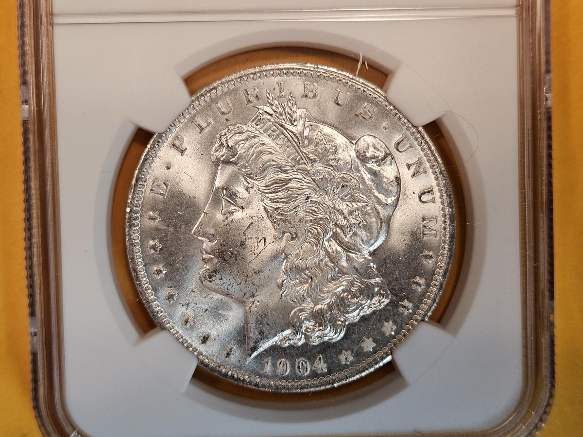 NGC 1904-O Morgan Dollar in Mint State 63