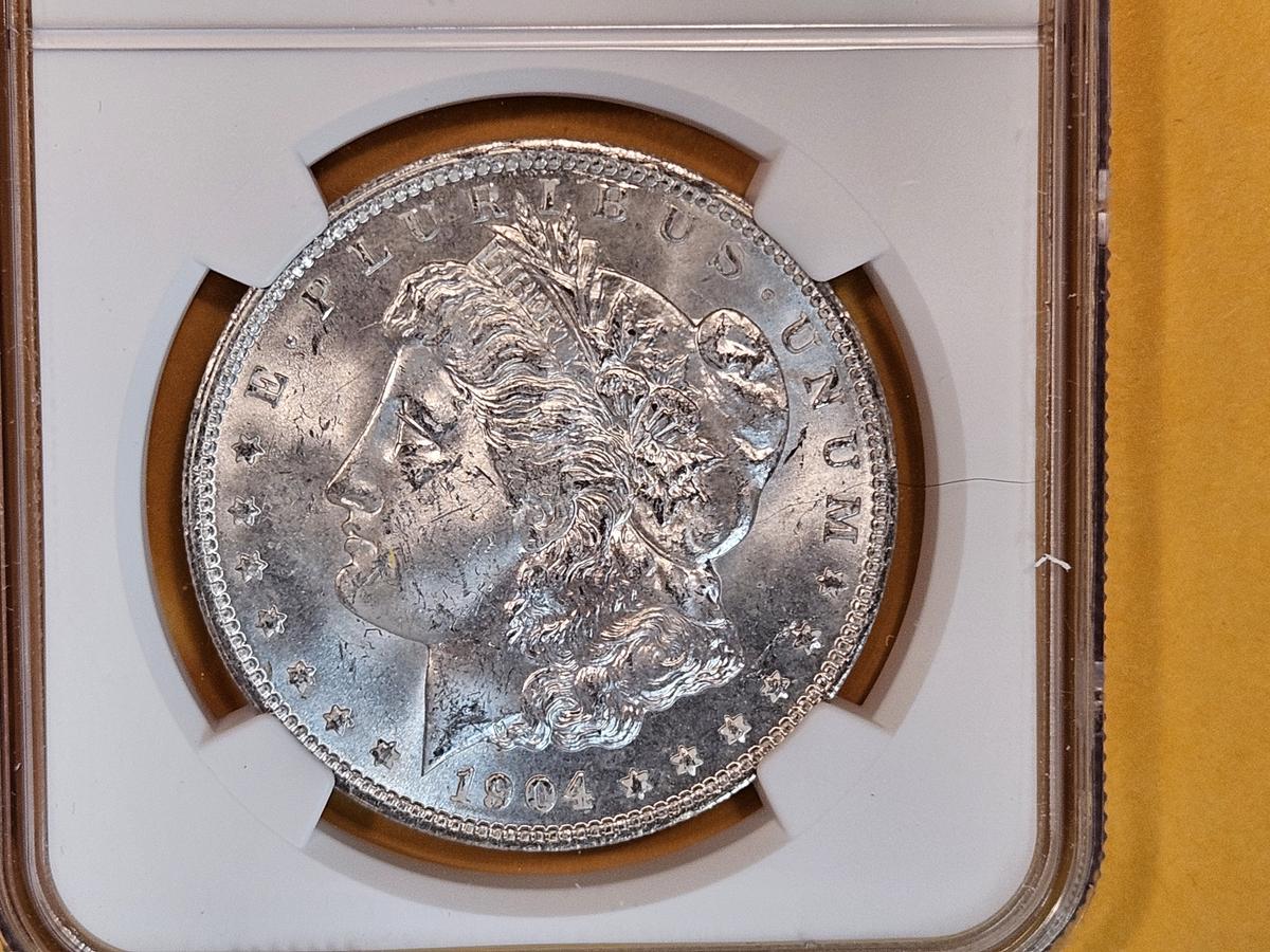 NGC 1904-O Morgan Dollar in Mint State 63