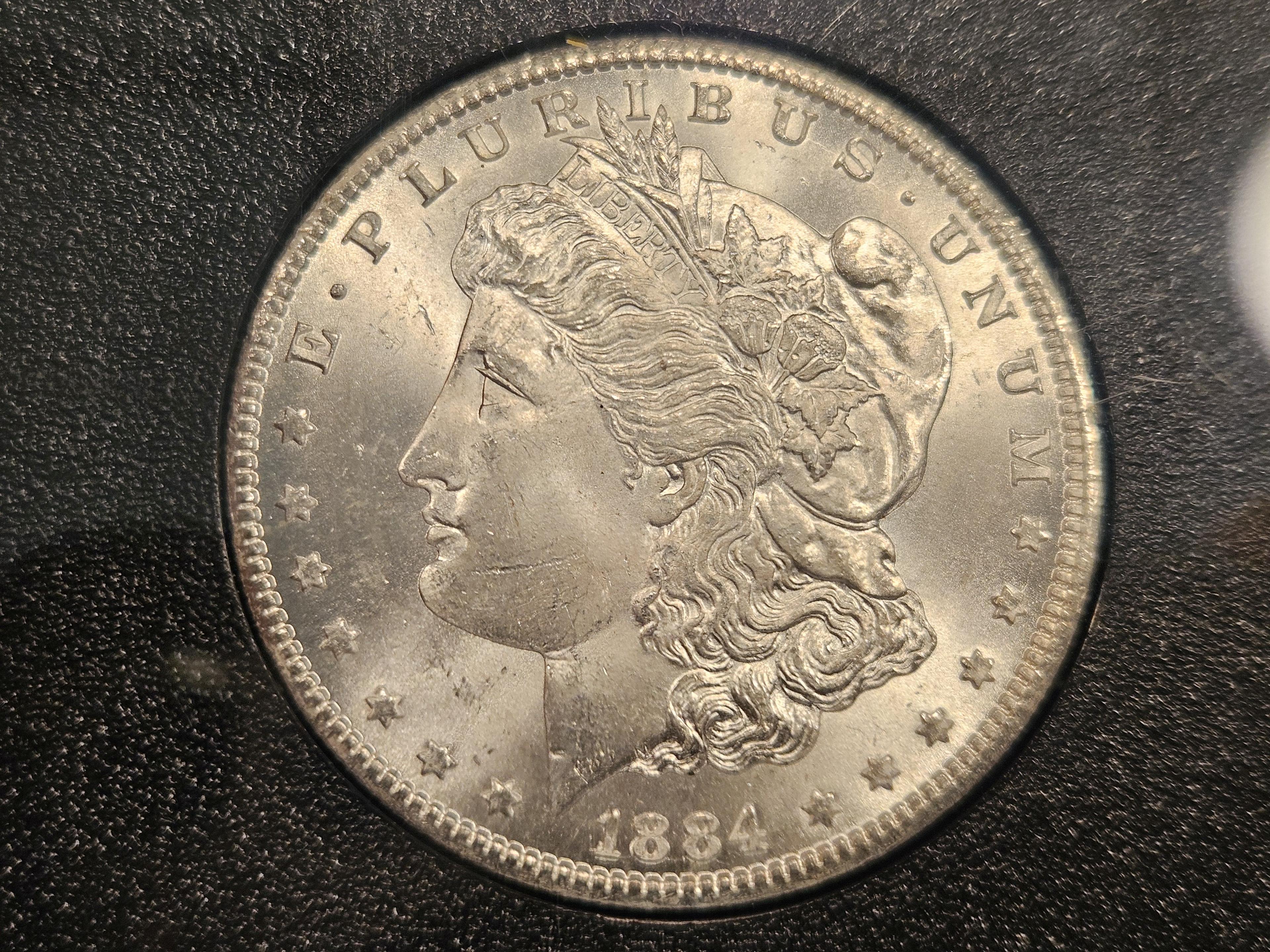 ** KEY DATE *** NGC GSA HOARD 1884-CC Morgan Dollar in Mint State 63
