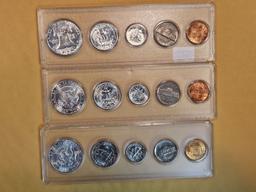 Three brilliant uncirculated US silver coin sets