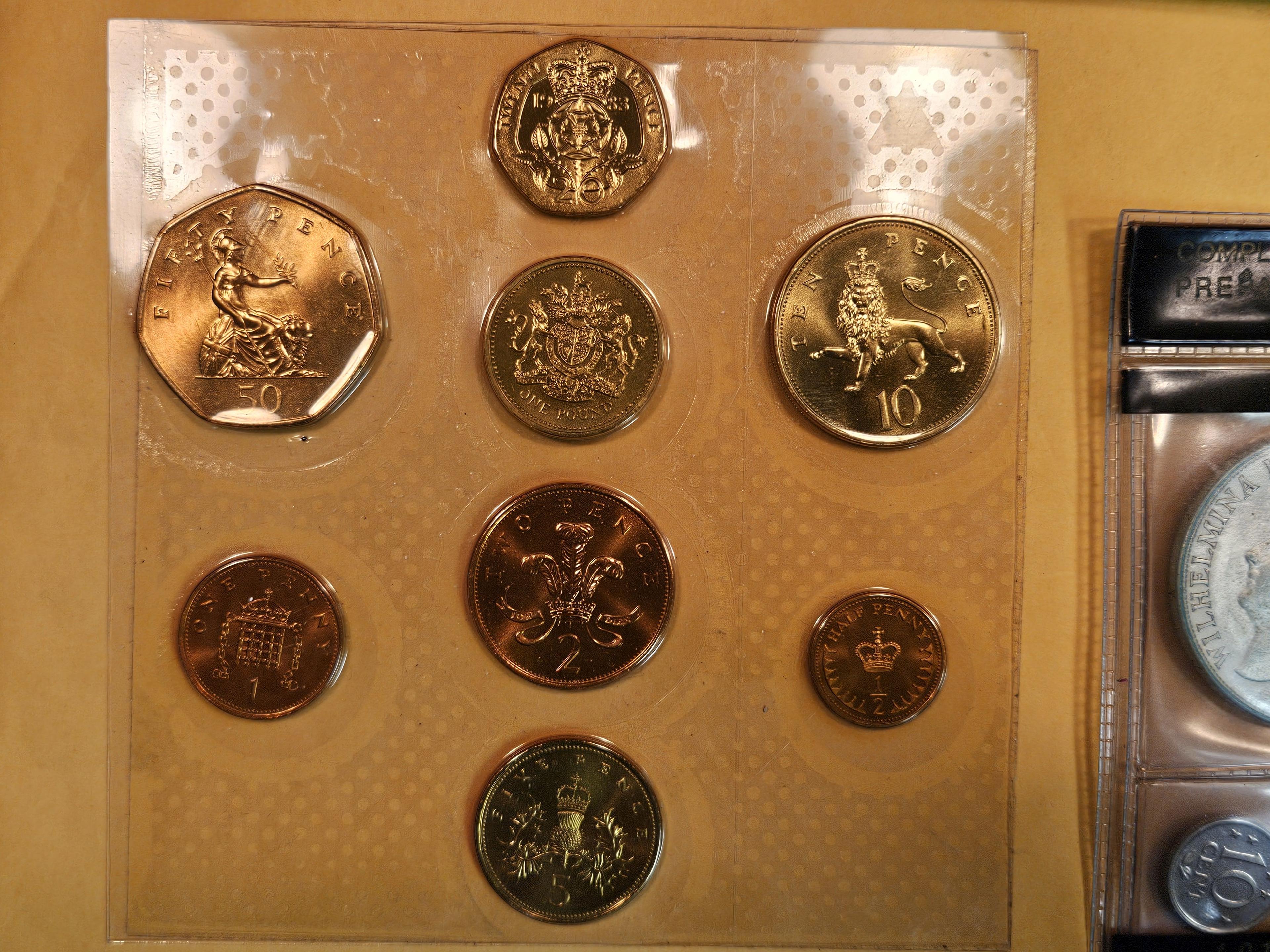 Group of five World coin sets