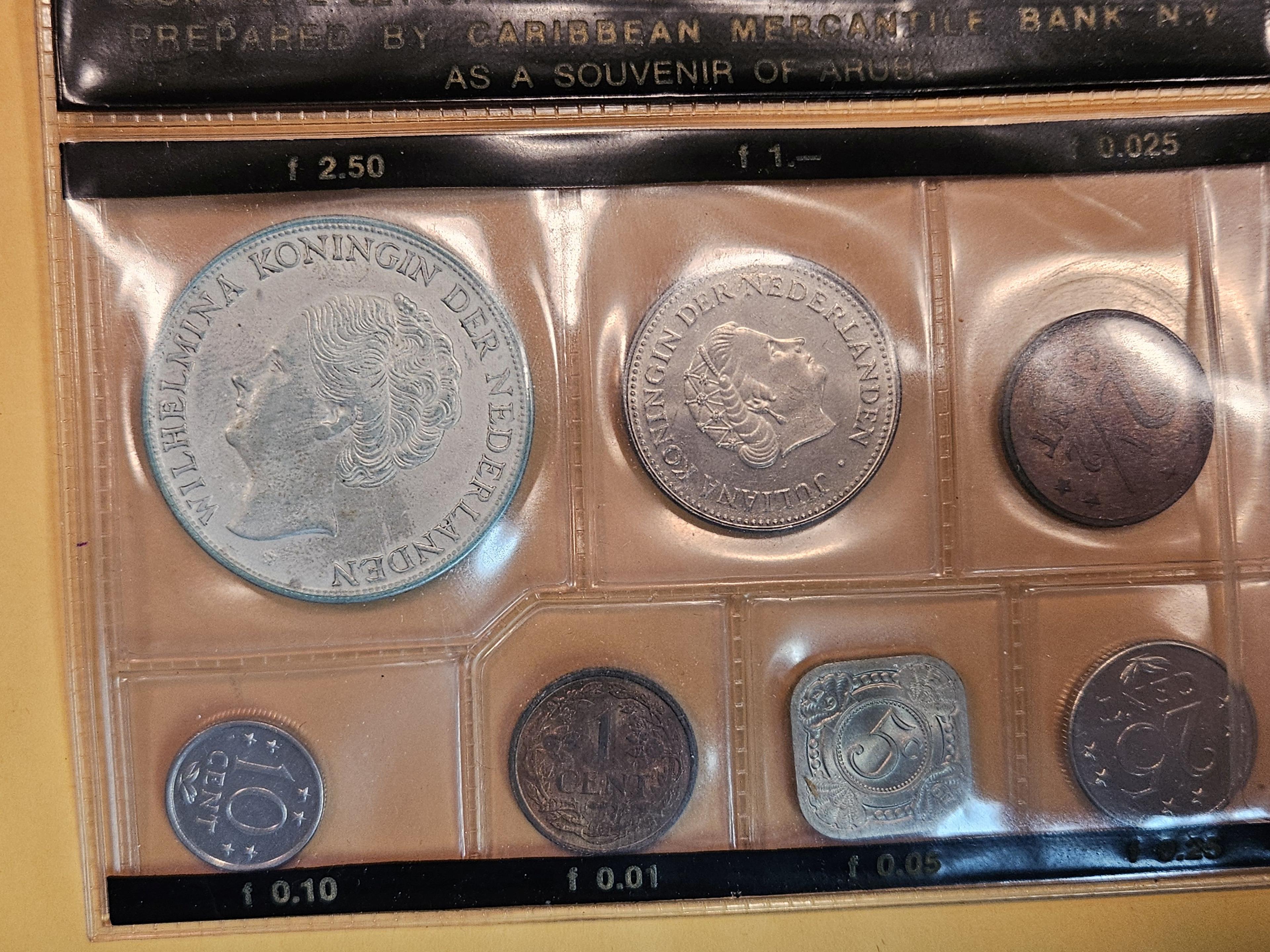 Group of five World coin sets