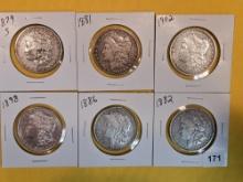 Six Morgan Silver Dollars