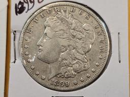 Two About Uncirculated Morgan Silver Dollars