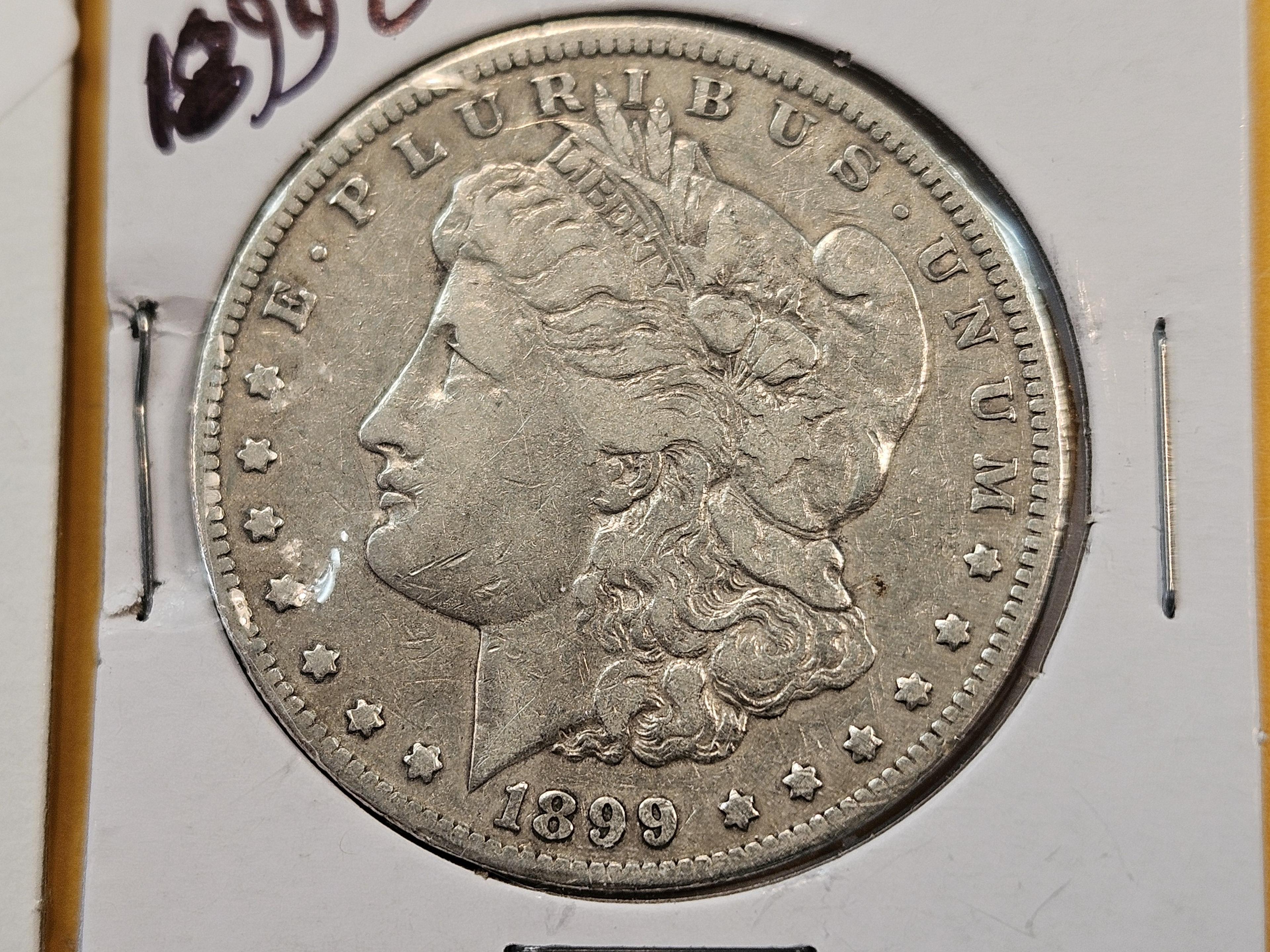 Two About Uncirculated Morgan Silver Dollars
