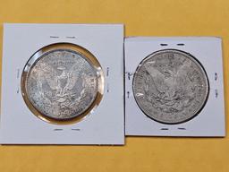 Two About Uncirculated Morgan Silver Dollars