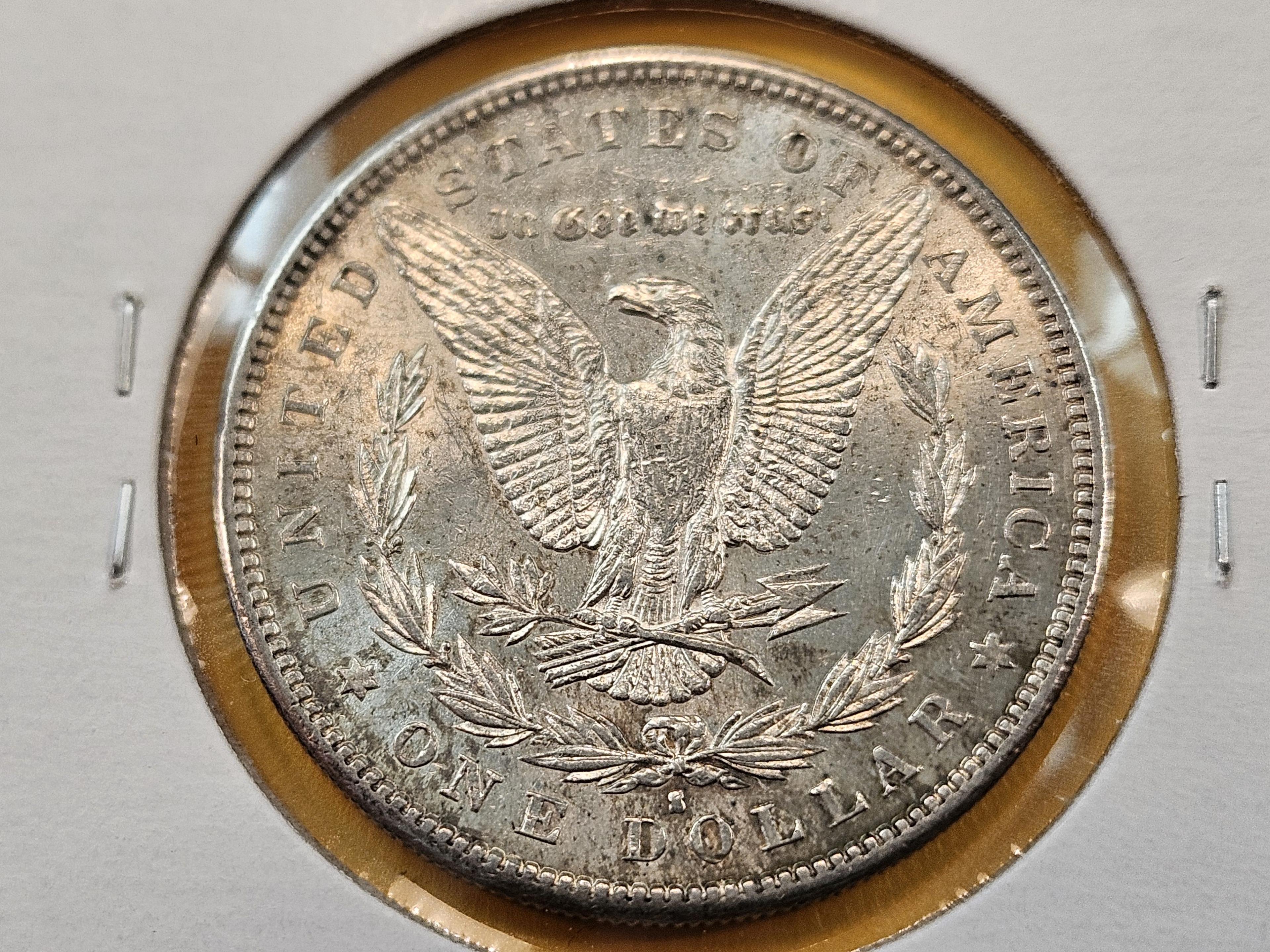 Two About Uncirculated Morgan Silver Dollars