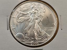 Four GEM Brilliant Uncirculated American Silver Eagles