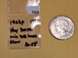 ** KEY DATE ** 1928 Peace Dollar in Brilliant About Uncirculated - 58!