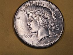 ** KEY DATE ** 1928 Peace Dollar in Brilliant About Uncirculated - 58!