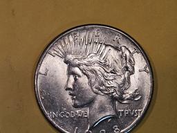 ** KEY DATE ** 1928 Peace Dollar in Brilliant About Uncirculated - 58!