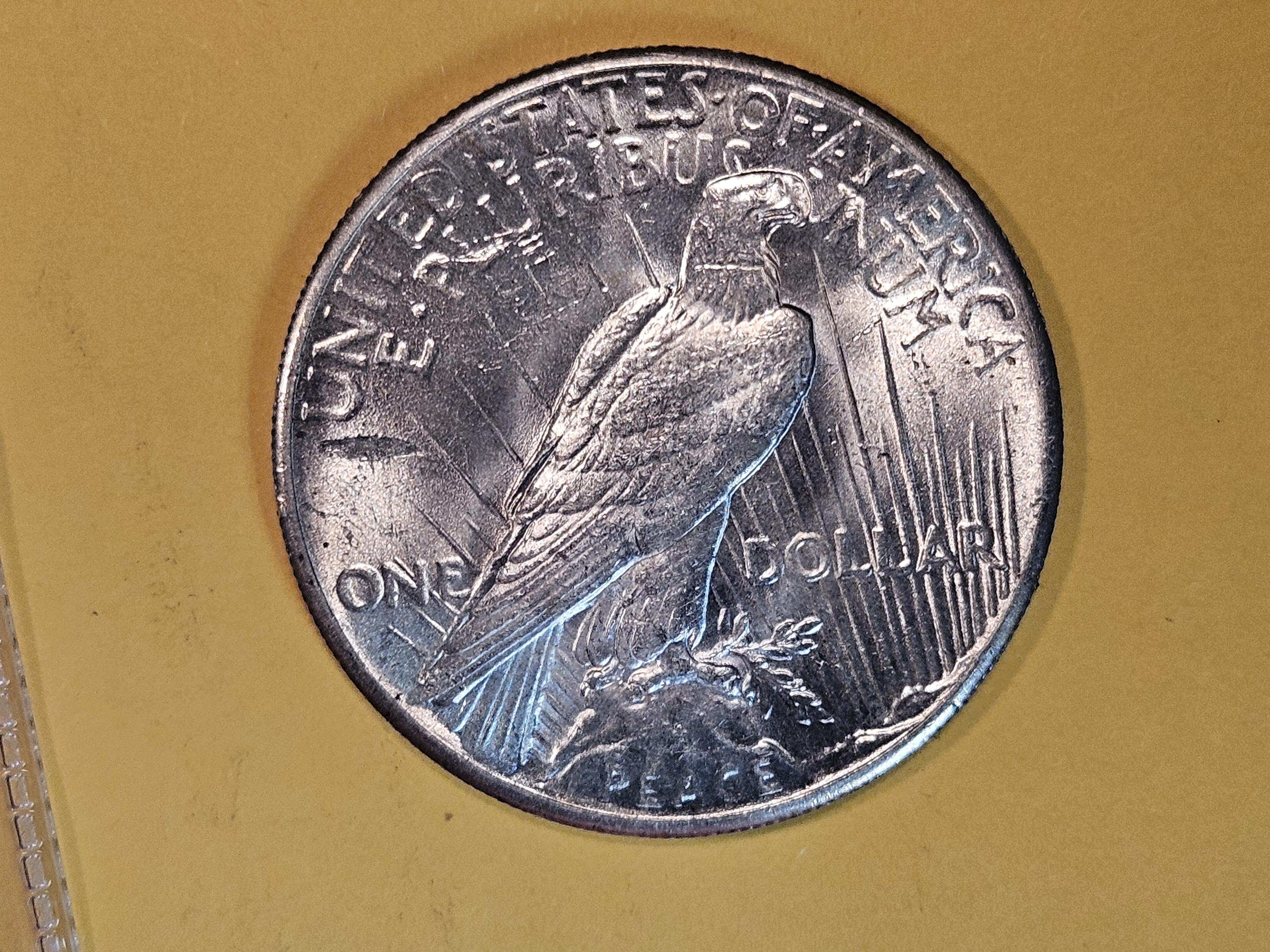 ** KEY DATE ** 1928 Peace Dollar in Brilliant About Uncirculated - 58!