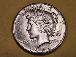 ** KEY DATE ** 1928 Peace Dollar in Brilliant About Uncirculated - 58!