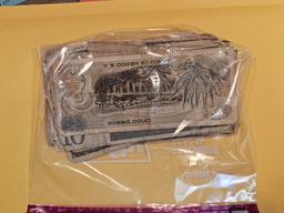 Fifty mixed pieces of World Currency