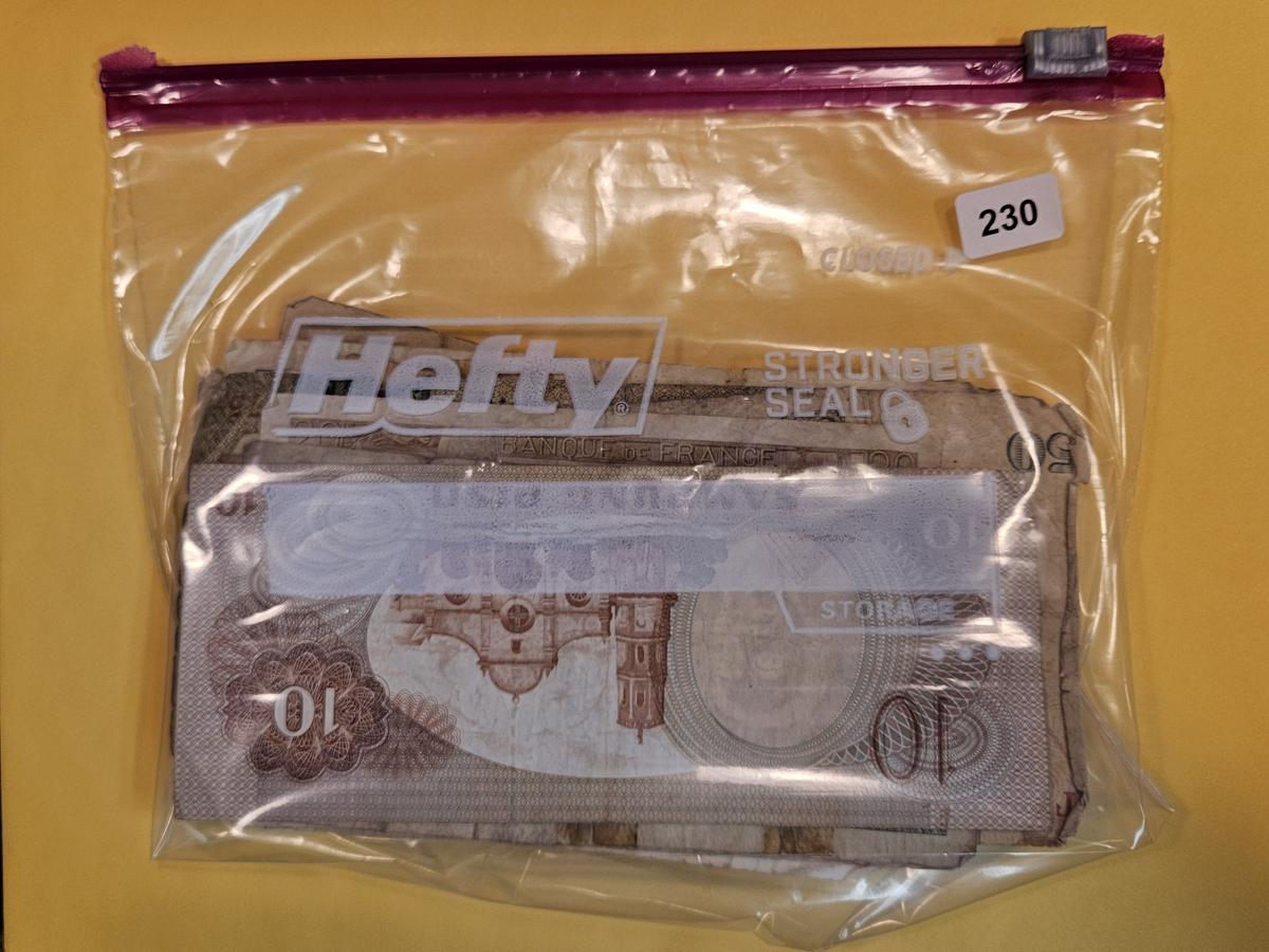 Fifty mixed pieces of World Currency