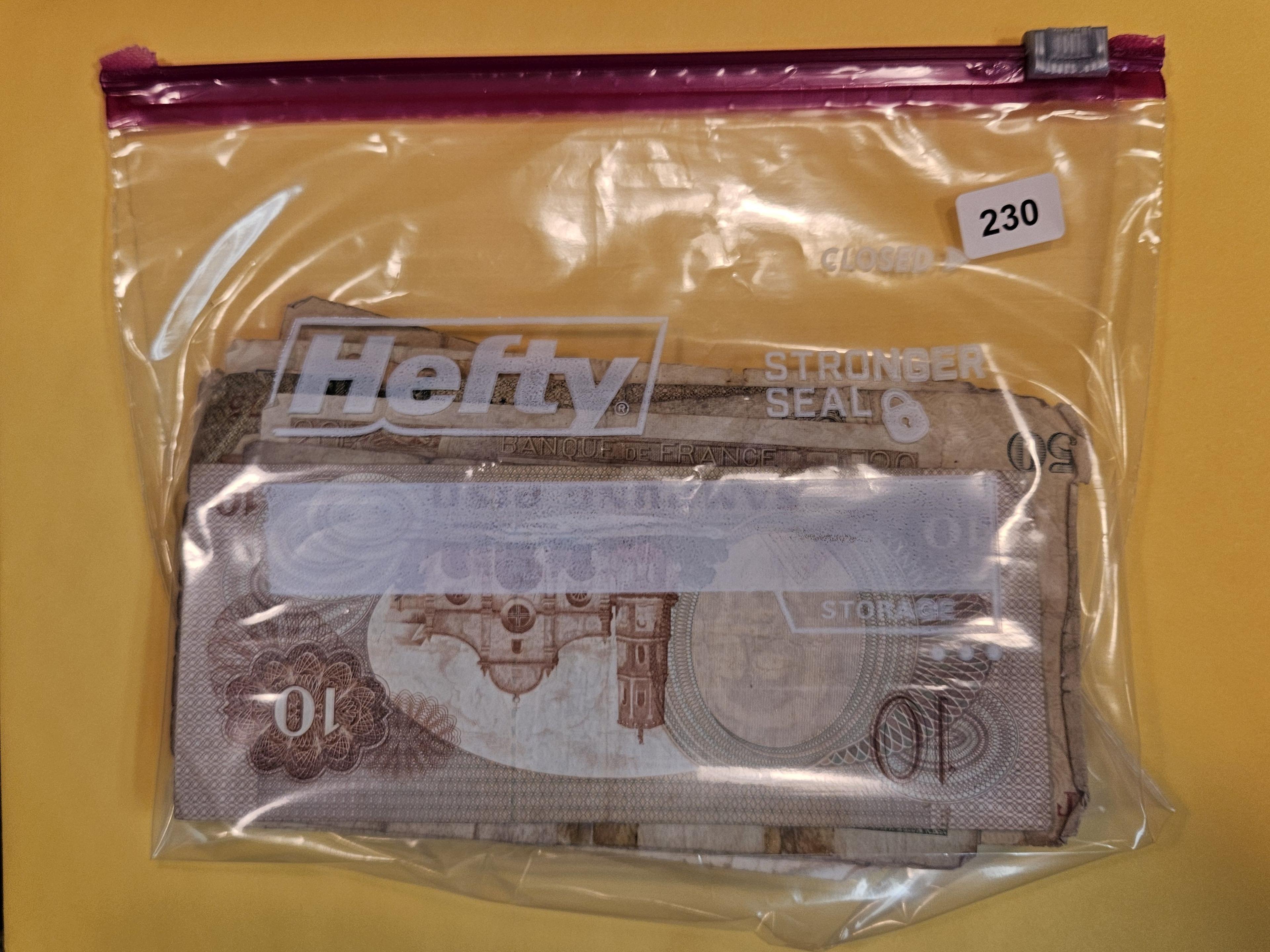 Fifty mixed pieces of World Currency