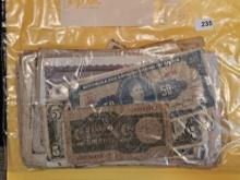 Fifty mixed pieces of World Currency