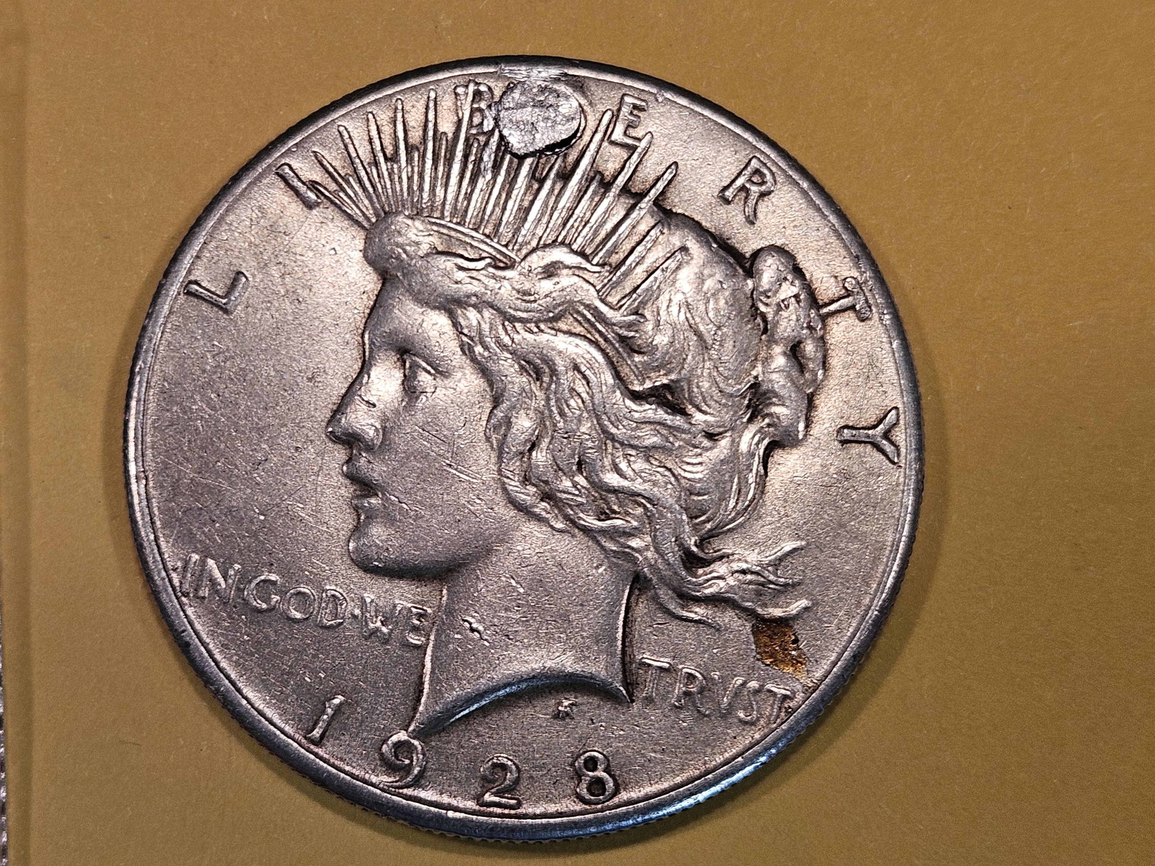 ** KEY DATE ** 1928 Peace Dollar in Extra Fine plus - details