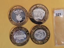 Four Ten Dollar .999 fine silver center Casino Gaming Tokens