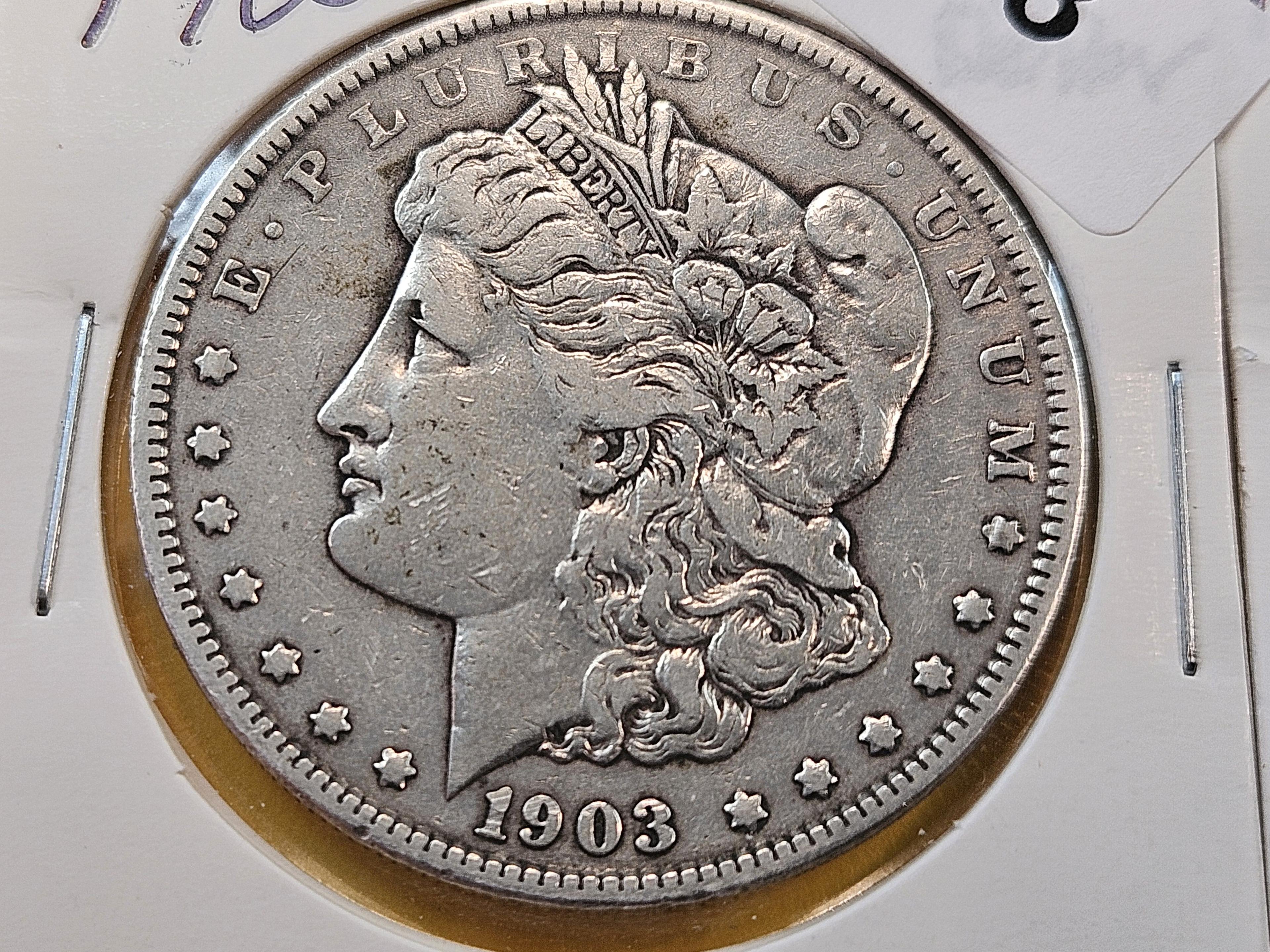 Two Morgan Silver Half Dollars