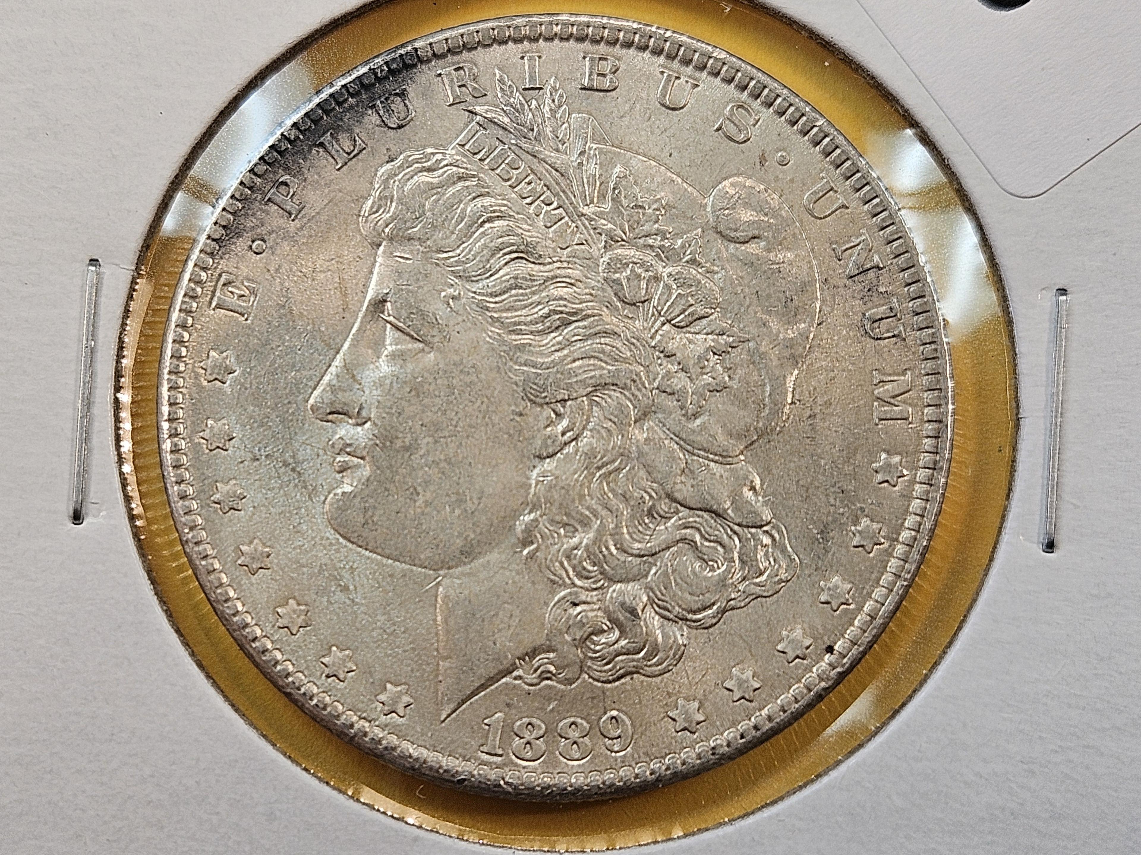 Two Bright About Uncirculated Morgan Silver Dollars