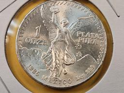 GEM Brilliant Uncirculated 1985 Mexico Silver Onza