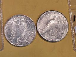 Two Brilliant About Uncirculated plus Peace Silver Dollars