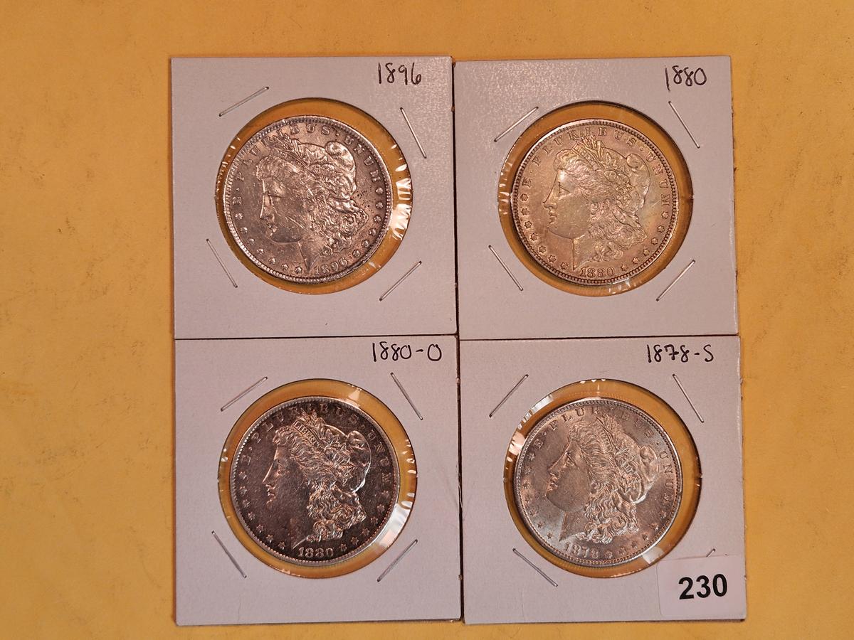 Four mixed Morgan Silver Dollars