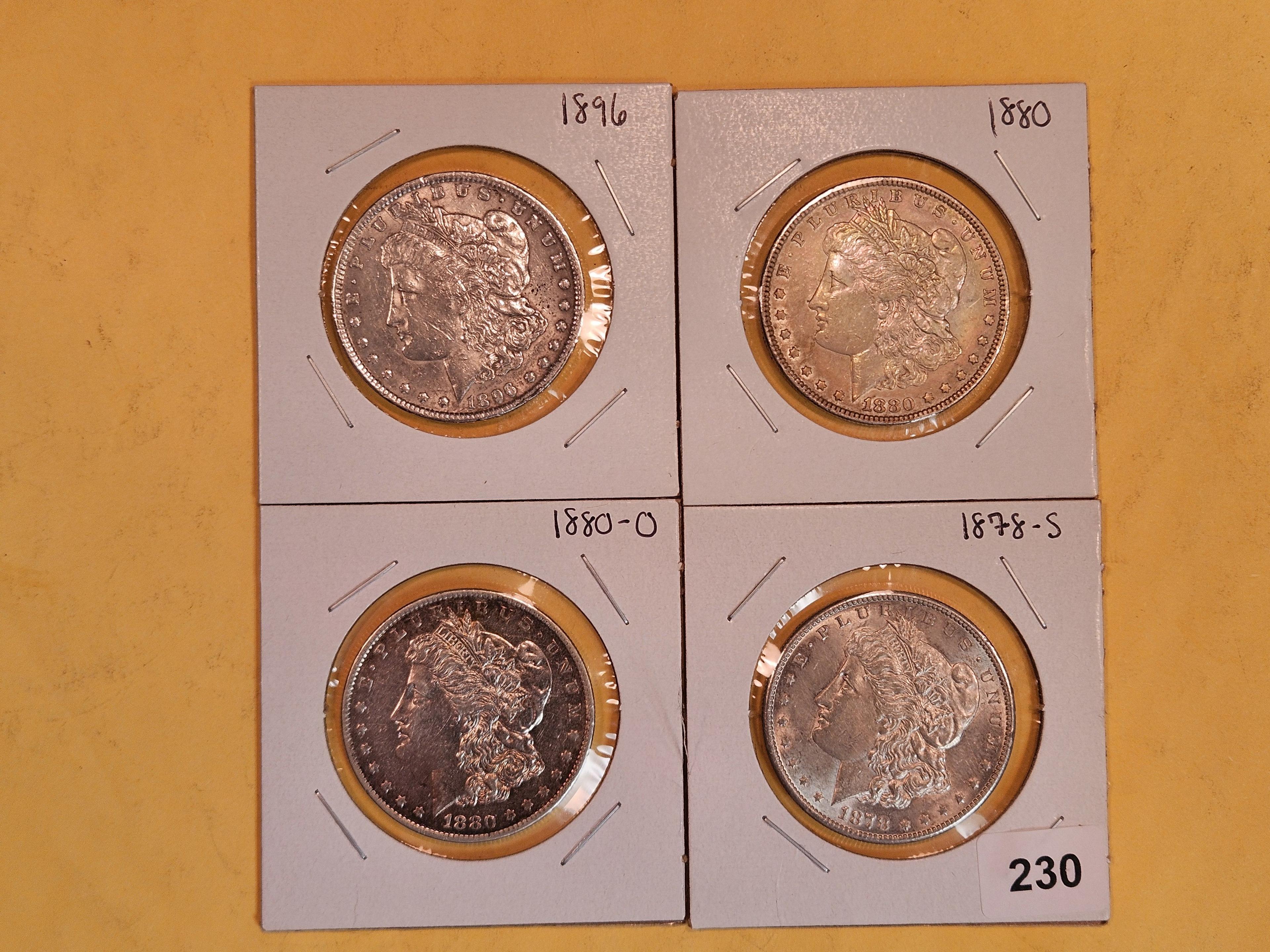 Four mixed Morgan Silver Dollars