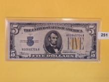 Series of 1934-A Five Dollar Silver Certificate Yellow Seal in About Uncirculated