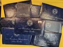Ten, mixed, GEM Brilliant Uncirculated SILVER BLUE IKE sets