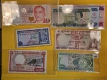 Eight mixed pieces of Oceana and Eastern Asian currency