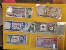 Twenty-four mixed pieces of World Currency