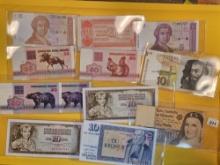 Twenty-three mixed pieces of World Currency