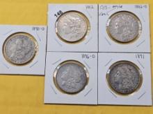 Five Circulated Morgan Silver Dollars