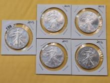 Five GEM Brilliant Uncirculated American Silver Eagles