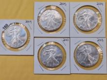 Five GEM Brilliant Uncirculated American Silver Eagles