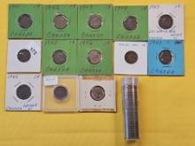Thirteen raw Canadian Pennies and One Roll of Circulated Mixed Canadian Pennies