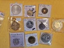 Ten more mixed cool pieces of exonumia