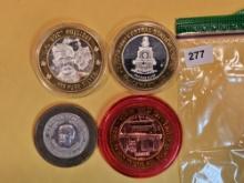 Four Ten Dollar .999 fine Silver Center Casino Gaming Tokens