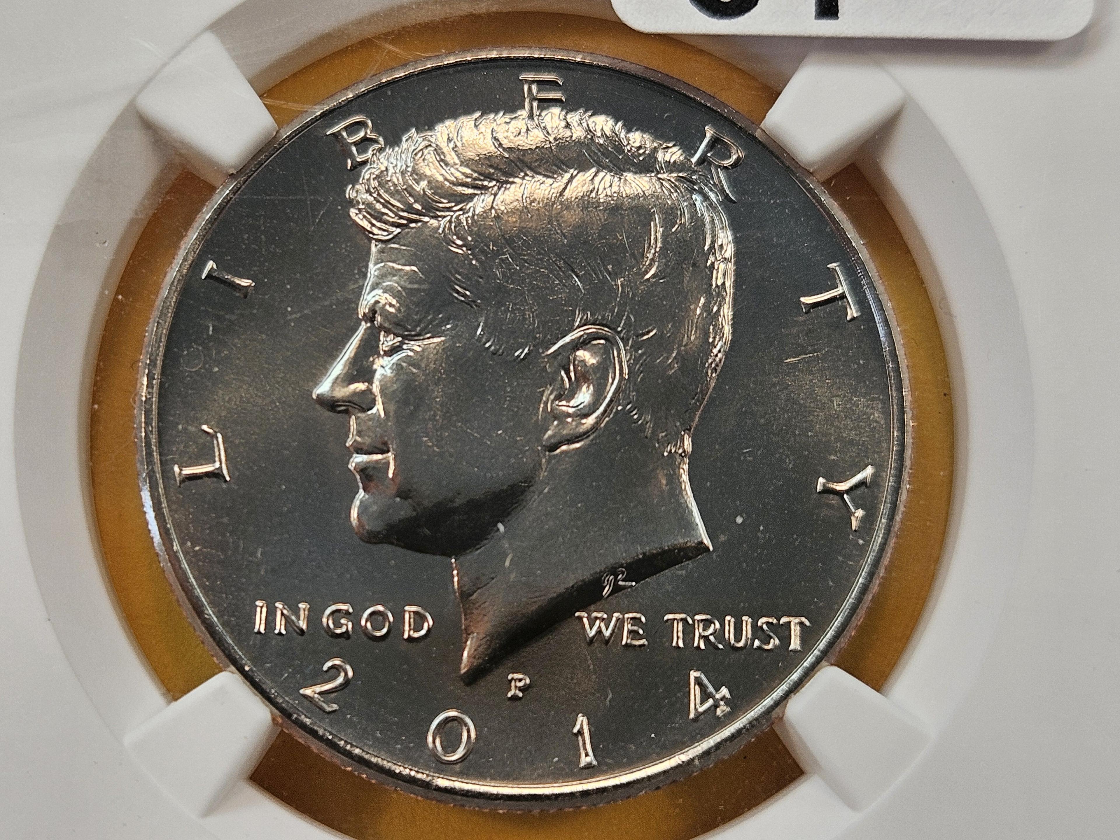 Two NGC Graded Kennedy Clad Half Dollars