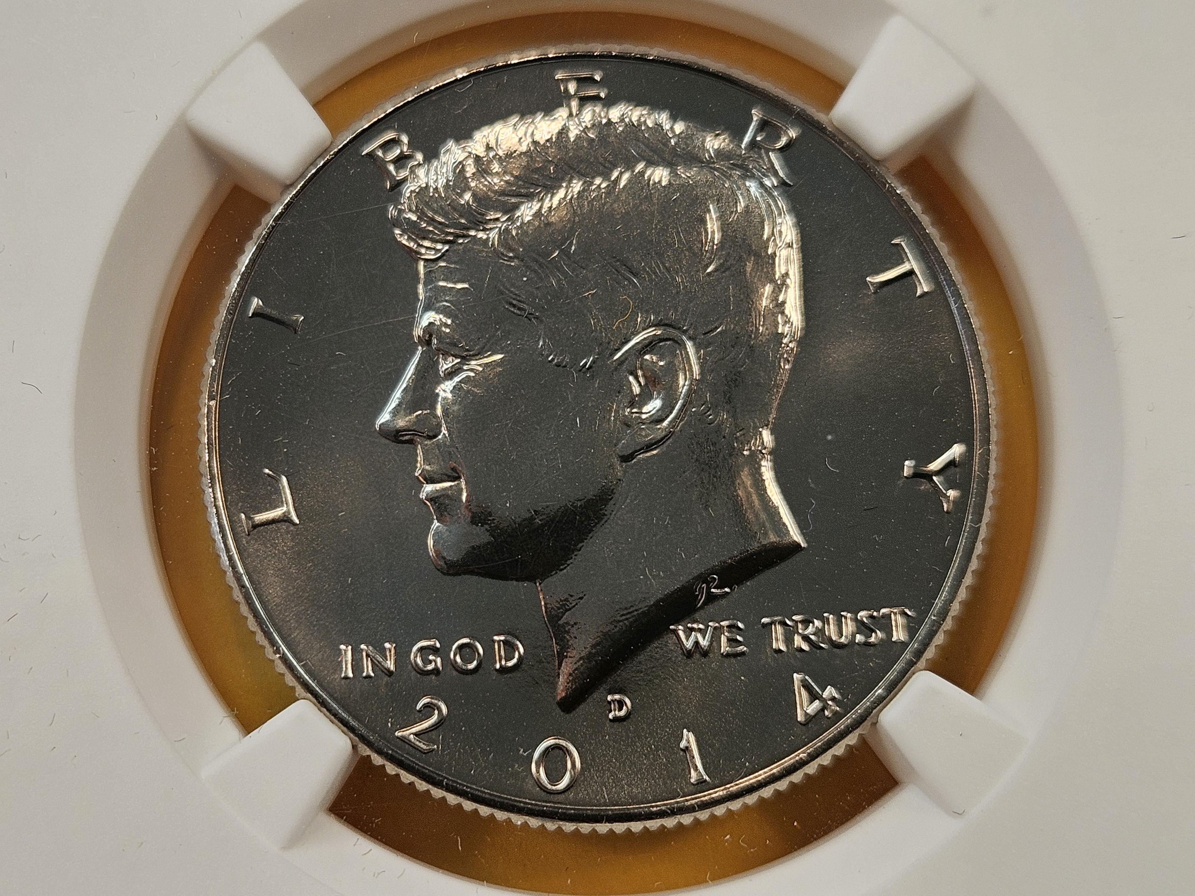 Two NGC Graded Kennedy Clad Half Dollars