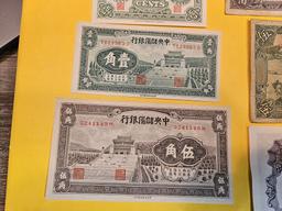 Seven nicer mixed Chinese bank notes