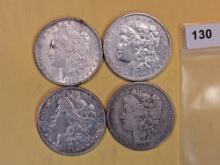 Four mixed Morgan Silver Dollars