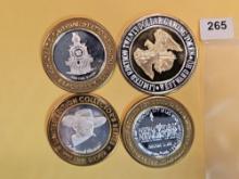 Four Silver center Ten Dollar Casino Gaming Tokens
