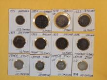 Twelve nicer, mixed, World Coins