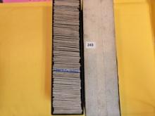 Full, single-row Stock box of mixed World coins